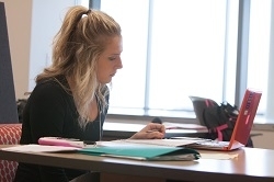 picture of a student looking a materials